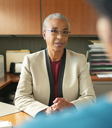 Woman representing a healthcare provider helping a person understand their diagnosis and how LYBALVI® (olanzapine and samidorphan) may help